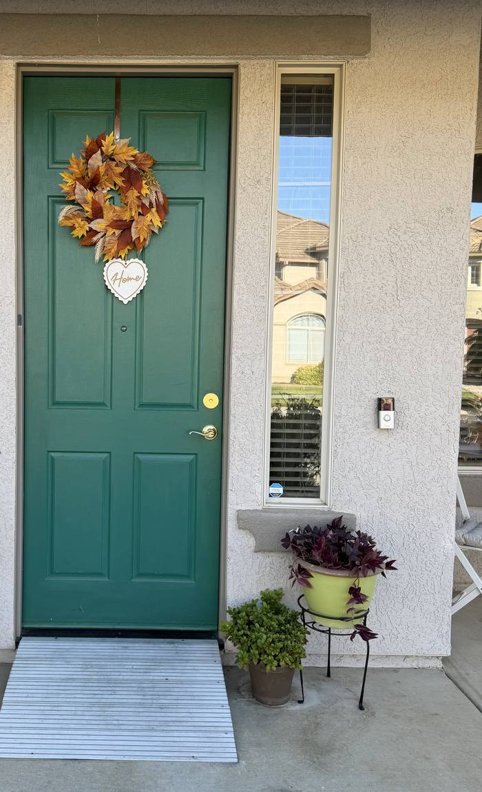 Step-free front entry with a ramp at the green front door